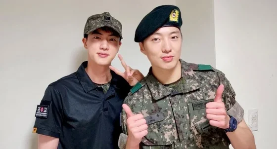 BTS Jin Unites Fandoms Through Photos With WINNER’s Kang Seungyoon in the Military